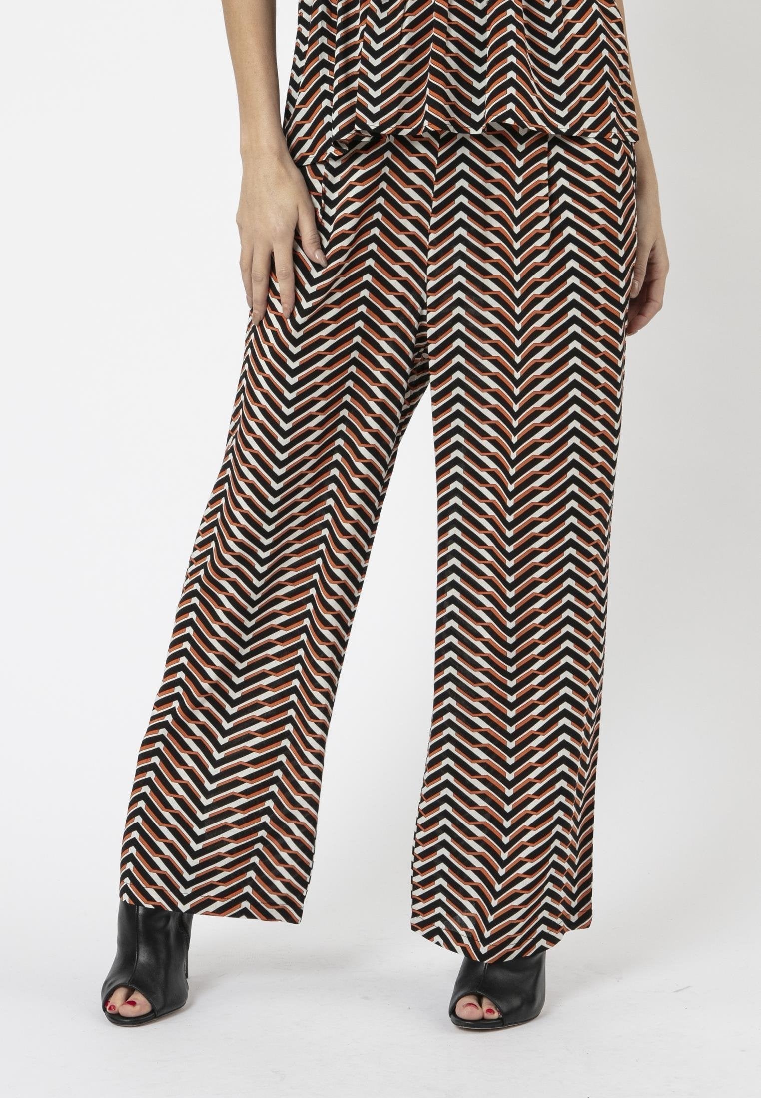 RELIGION Arrow All Over Print Trousers