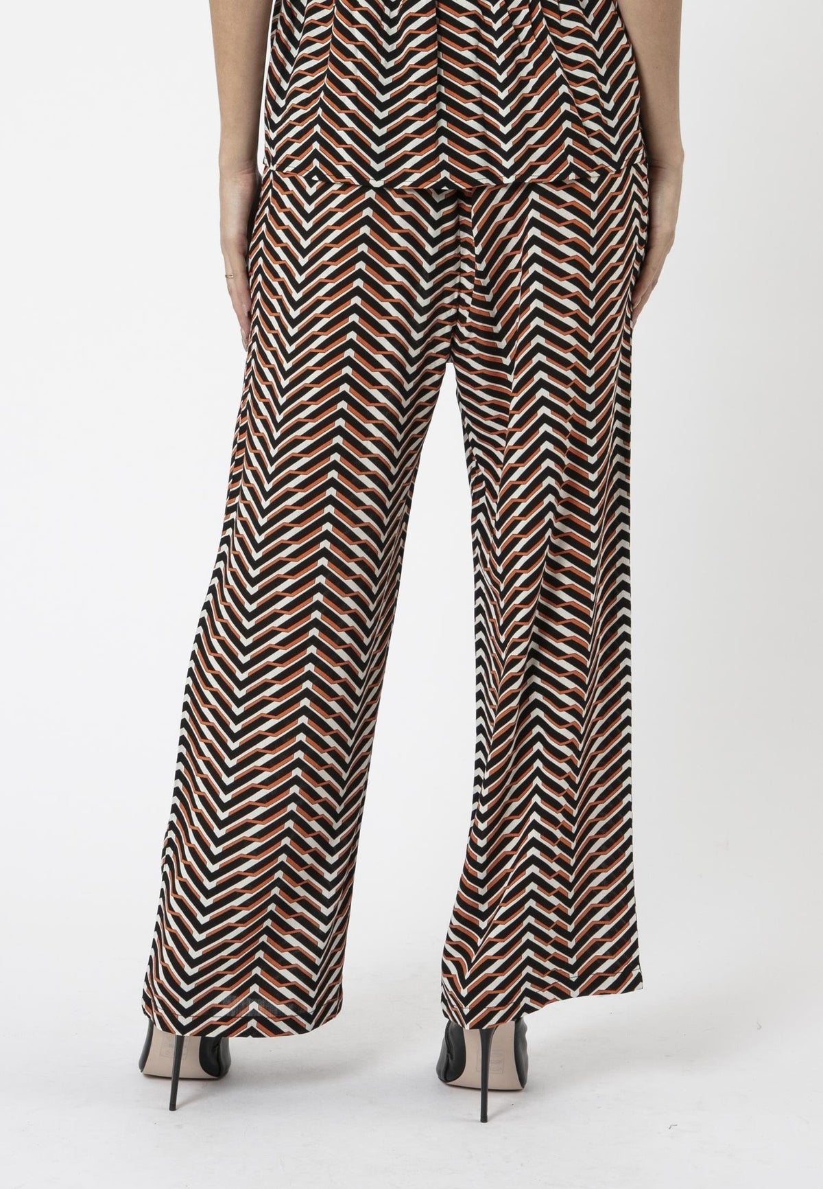 RELIGION Arrow All Over Print Trousers